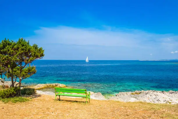 Photo of Croatia, Dugi otok island, sailing boat on sea in bay on Veli Rat