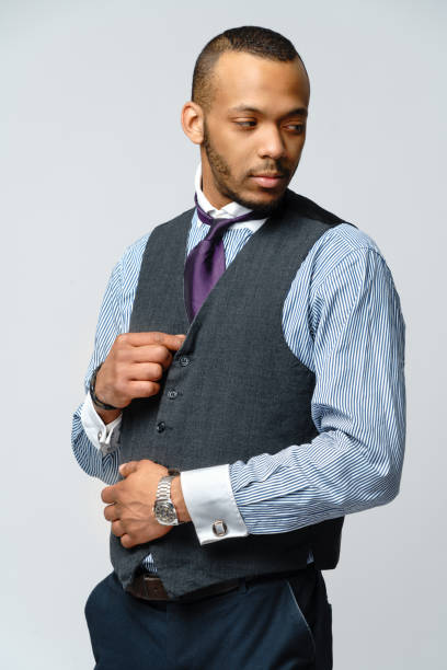 istock African-American man face portrait over grey background 1258094638