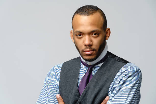 istock African-American man face portrait over grey background 1258094651