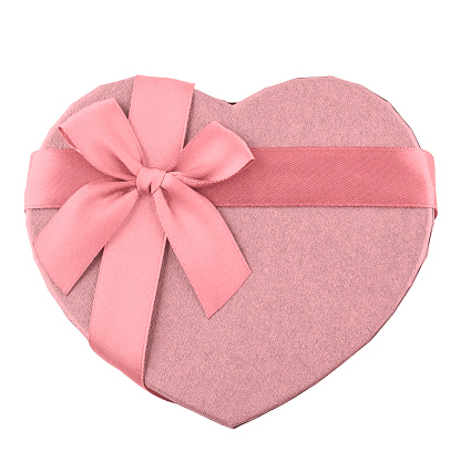 Heart shaped gift box with rose ribbon and bow on a white background isolated. Copy space. Top view.