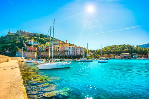 Photo of Porto Ercole village and harbour. Argentario, Tuscany, Italy