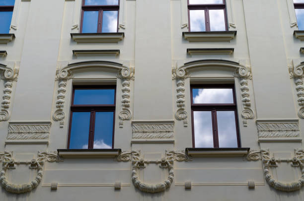 Liberec, Liberec Region, Czech Republic - June 26, 2020: Low angle view of Art Nouveau The Golden Lion (cs. Zlatý Lev) Clarion Grand Hotel building with windows.