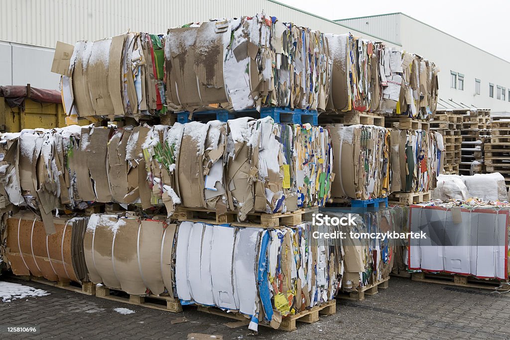 Paper baled Cardboard redy for recycling, any logos and brand names have been removed Cardboard Stock Photo