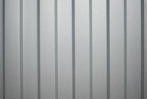istock Gray metal background with stripes. 1258107487