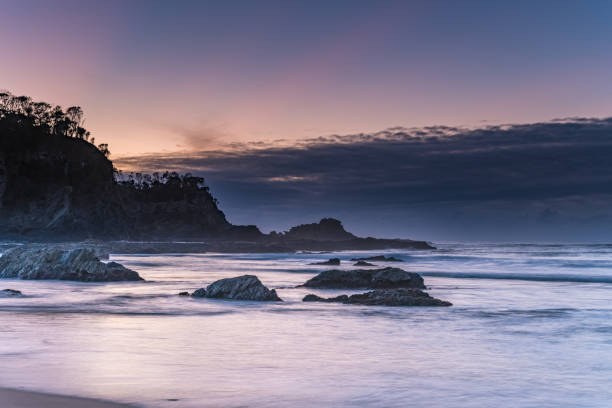 istock Sunrise seascape and low cloud bank 1258113579