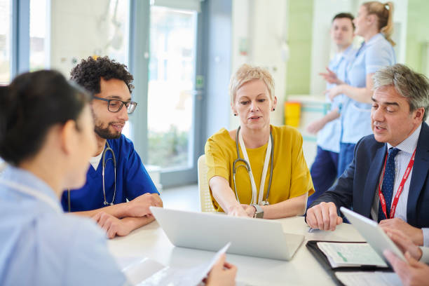 istock medical facility admin meeting 1258121567