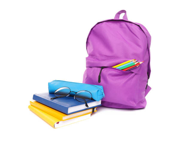 istock School backpack and stationery isolated on white background 1258122527