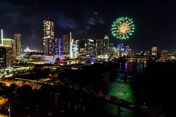 istock Green Fireworks Explode in Color over Austin Texas Cityscape 1258124153