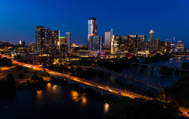 istock Long Exposure Drone View above Austin Texas Skyline at Night gorgeous Nightscape 1258124164