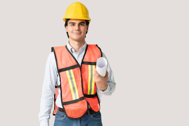 Confident Contractor Wearing Hardhat And Vest