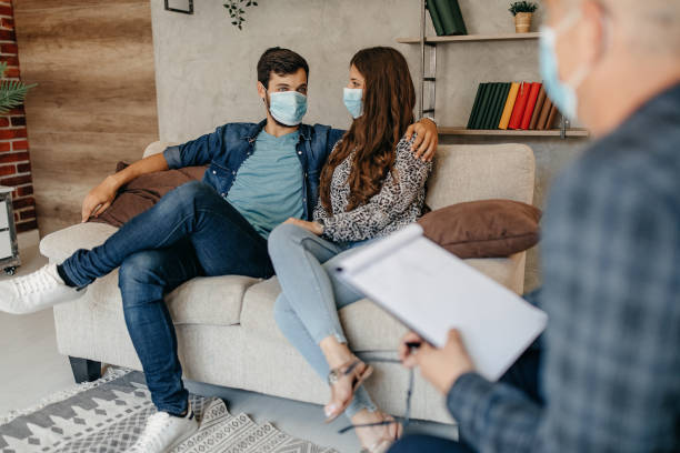 istock Young couple on a therapy session with a psychologist 1258126319