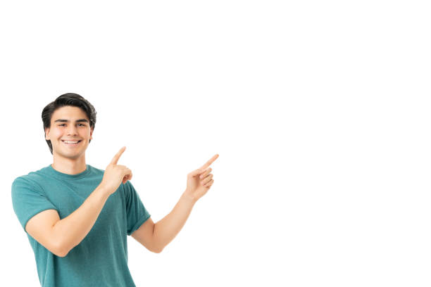 istock Smiling Man Pointing At Copy Space With Fingers 1258126360