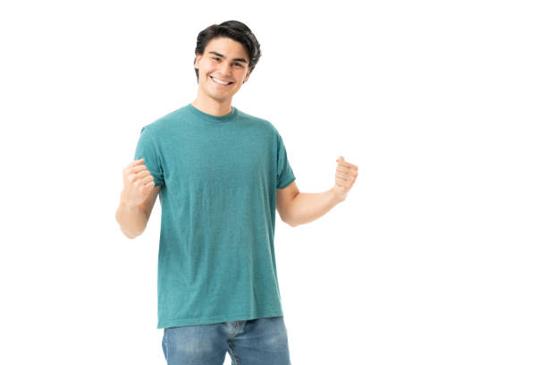 istock Handsome Man Celebrating Good News 1258126374