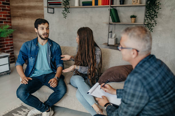 istock A young married couple with a psychotherapist 1258126451