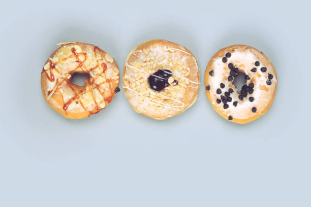 istock Donut cakes isolated on gray background 1258129609