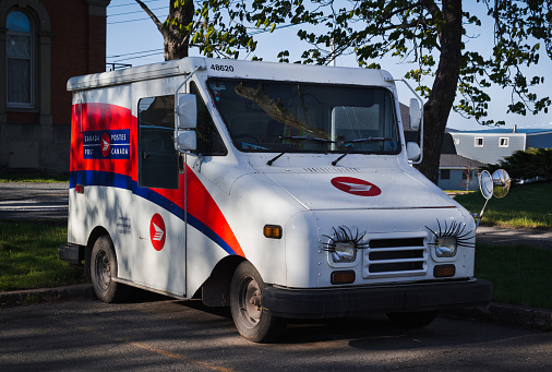 Pictou, Canada - May 21, 2017: Canada Post delivery truck. Canada Post Corporation is Canada's main postal service provider and is a crown corporation.