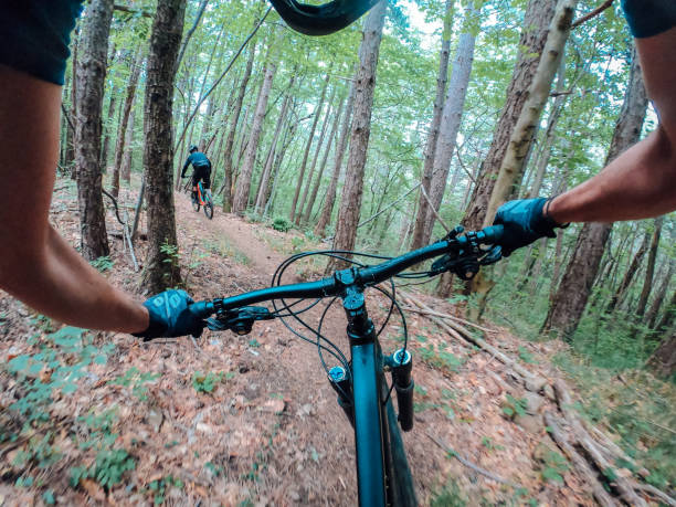istock Friends mountain biking point of view 1258135409