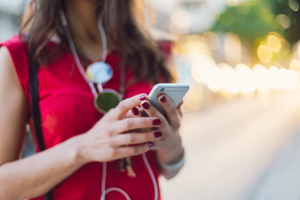 istock Close-up of texting woman 1258135527