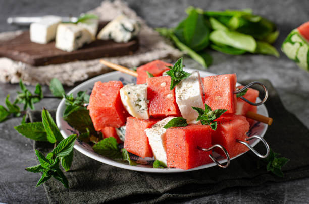 istock Delicious spicy skewers with watermelon 1258136436