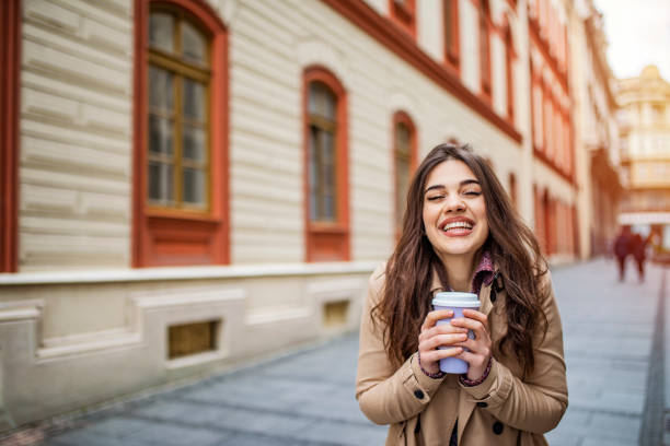 istock Beautiful woman walking outdoors on a sunny day. 1258136710