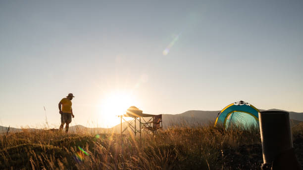 istock Adult Man Looking At The View While Camping In Sunset 1258144068