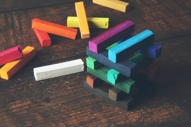 istock Artistic dry pastels on wooden table 1258145166