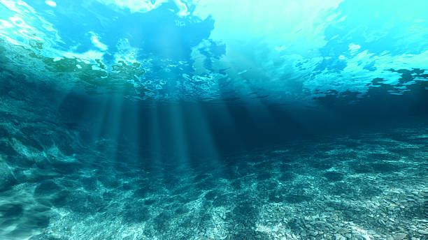 Blue ocean waves from underwater stock photo