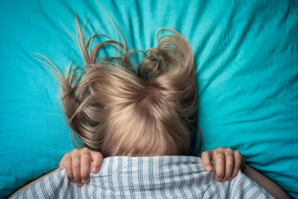 istock the child is afraid to sleep alone. child has nightmares 1258155146