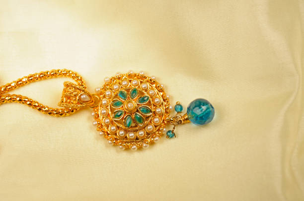 istock Pearl pendant with gold chain, Indian Traditional jewelry 1258159708