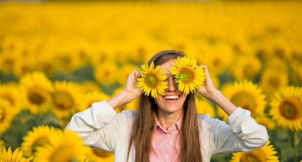 istock Beautiful carefree woman in fields 1258159719
