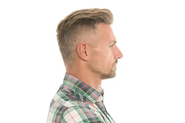 Barber salon. Perfect fringe. Styling fringe requires that you apply some pomade or wax and comb hair forward. Fringe hairstyles allow hair volume. Handsome mature man with stylish hairstyle.