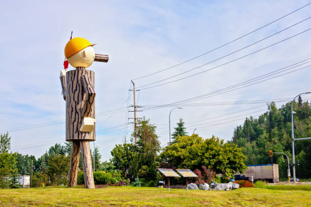 Mr. Prince George Prince George, Canada - June 29, 2020. Mr. PG greets the arrival of vehicles on the highway at the entrance to the city of Prince George, northern BC. prince george photos stock pictures, royalty-free photos & images