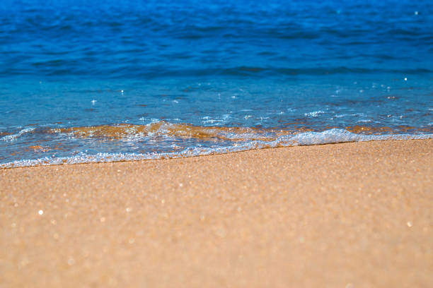 istock Soft waves on sandy beach. Macro photography 1258163847