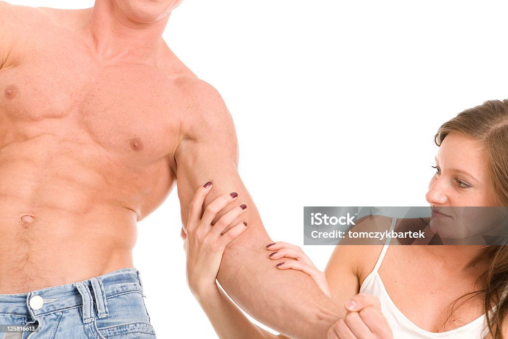 Muscular male torso Muscular male torso with woman's palms on white background.The young girl is watching muscles of the sexy man http://tools.stock-board.info/lightboxes/eb2144f4f5dabe7bd5392f0ea7f01e47 Active Lifestyle Stock Photo
