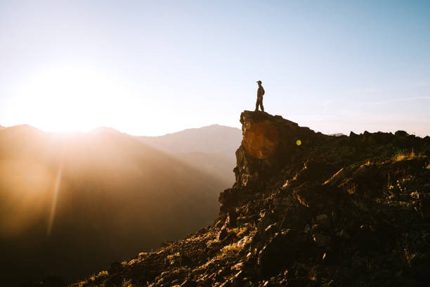 istock Backpacker Hiking Mountain Ridge With View of Olympics 1258167805