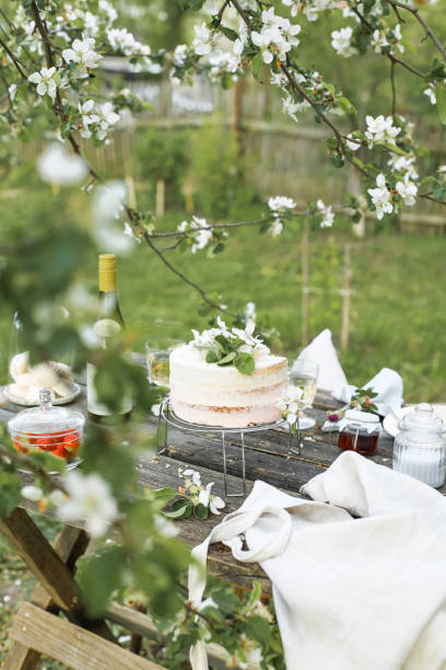 istock Details of a rustic wedding table with camomiles, nuts and wooden elements 1258167823