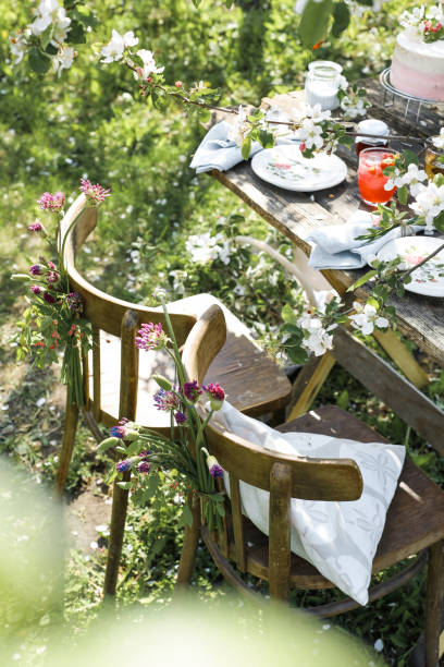 istock Details of a rustic wedding table with cake, strawberries, flowers and sweet elements 1258167829