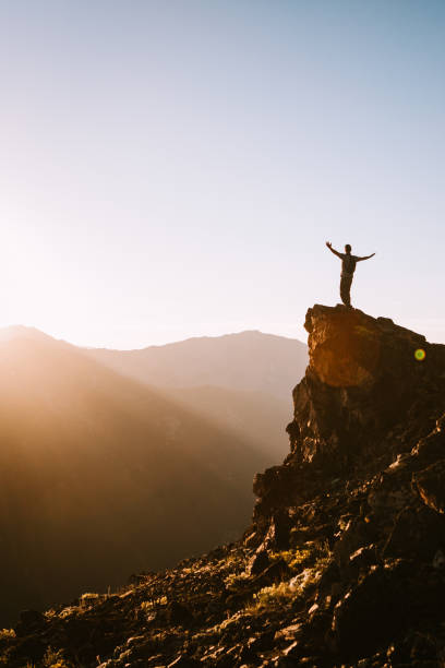 istock Backpacker Hiking Mountain Ridge With View of Olympics 1258168033