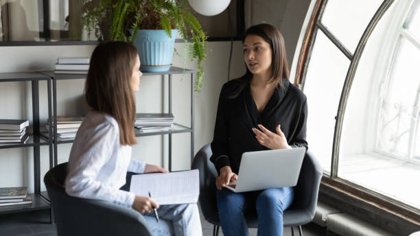 istock Multiracial female employees brainstorm cooperate in office 1258168106
