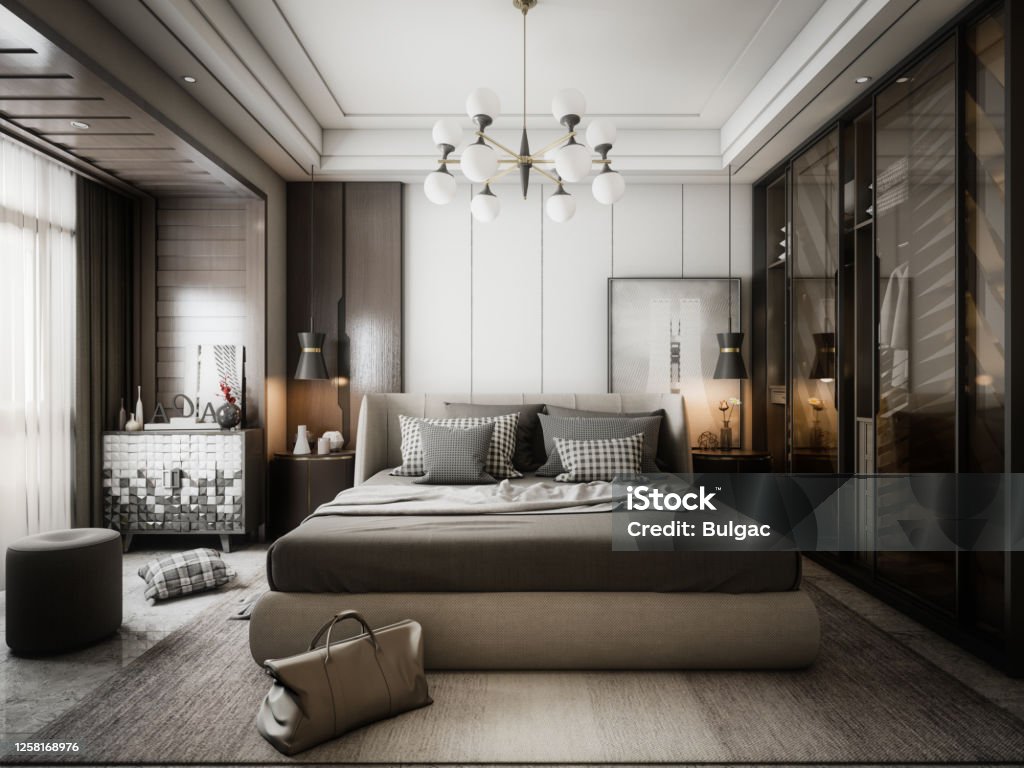Modern Style Bedroom Digitally generated modern style master bedroom interior design.

The scene was rendered with photorealistic shaders and lighting in Autodesk® 3ds Max 2020 with V-Ray 5 with some post-production added. Bedroom Stock Photo