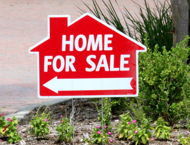istock Home for Sale Sign 1258172825