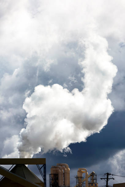 istock Industrial pollution, smoke from factory, background with copy space 1258175060