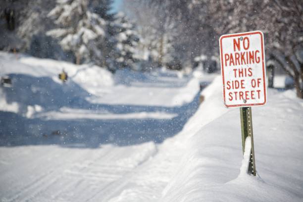 No Parking Sign on Snow Covered Road