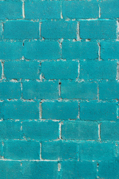 istock Old Brick Wall Painted Turquoise Paint. 1258183553