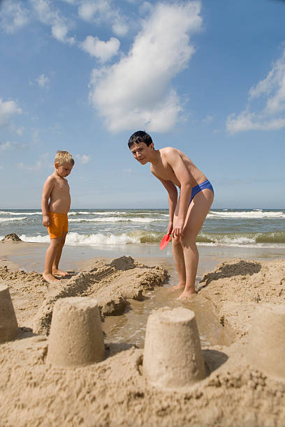 istock Family on the beach 125822462