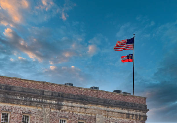 istock American and Georgia Flag on Old Brick 1258245094