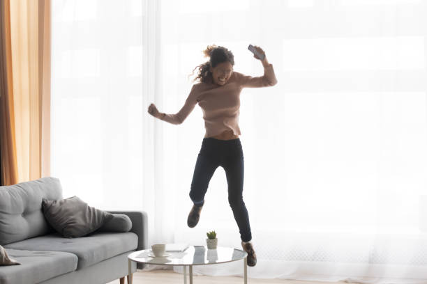 istock Overjoyed Caucasian woman excited with online win 1258280087