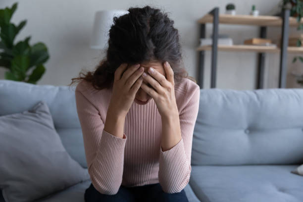 istock Unhappy young woman frustrated with life problems 1258280624