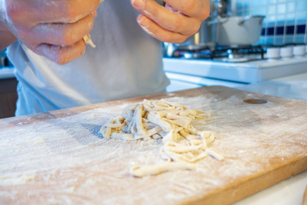 istock Homemade noodle cutting 1258354355