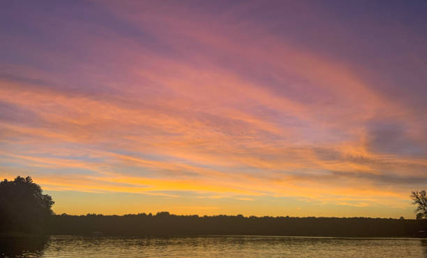 istock Colorful Sunset Over Lake 1258417545